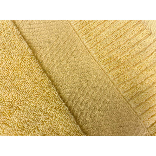Фото - Полотенце банное GM Textile желтое махровое зеро твист с бордюром 100х150