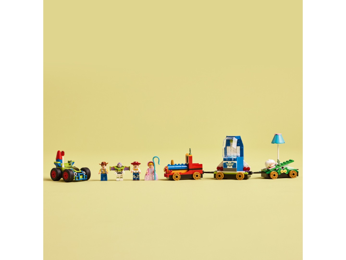 Конструктор LEGO Disney Pixar Святкування з Історії Іграшок: потяг і авто для перегонів (43264) — фото 10