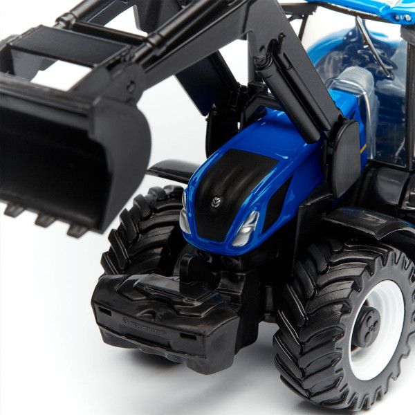 Фото - Колекційна сільськогосподарська техніка Bburago ТРАКТОР NEW HOLLAND T7.315 з фронтальним навантажувачем (синій, 1:32) (18-31632)