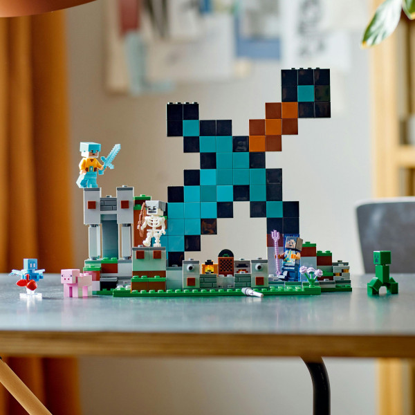 Фото - Конструктор LEGO Minecraft Форпост із мечем (21244)