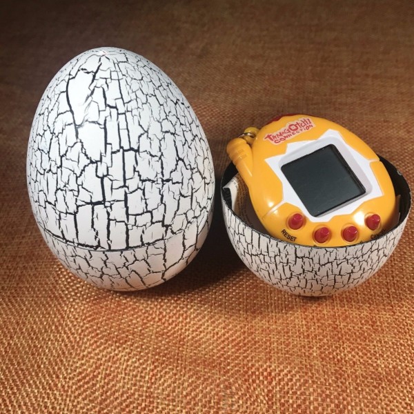 Фото - Интерактивная игрушка UFT Eggshell Game White Тамагочи в яйце динозавра (EggWhite)