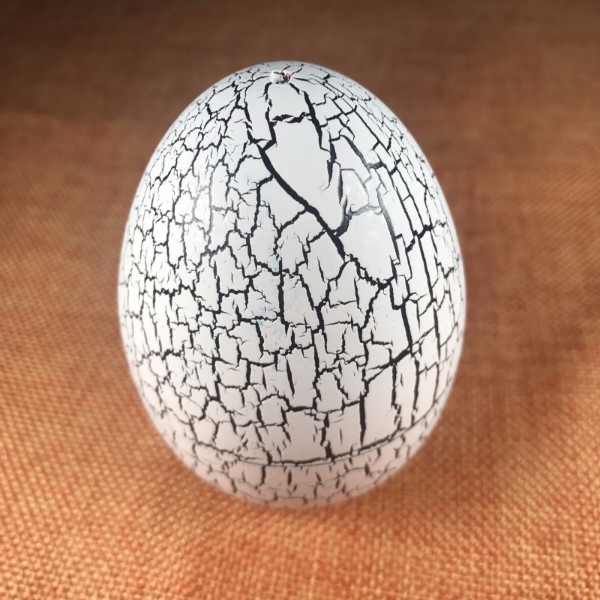 Фото - Интерактивная игрушка UFT Eggshell Game White Тамагочи в яйце динозавра (EggWhite)