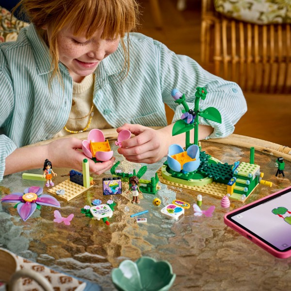 Фото - Конструктор LEGO  Friends Карусель із квітами й чашками та казкова фотобудка (42702)