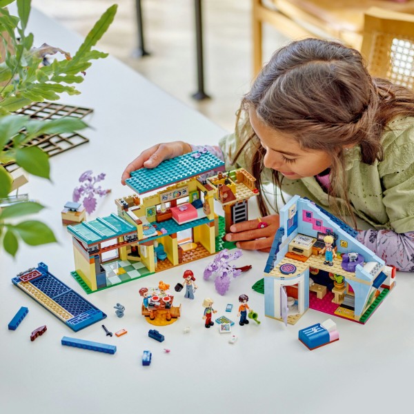 Фото - Конструктор LEGO Friends Семейные дома Олли и Пэйсли (42620)