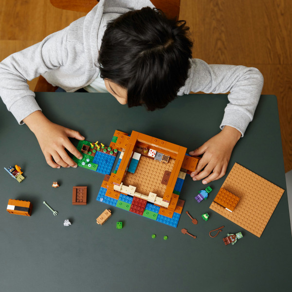 Фото - Конструктор LEGO Minecraft Дом в форме лягушки (21256)