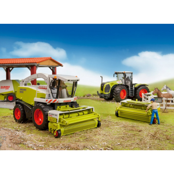Фото - Наземна спецтехніка BRUDER Трактор Claas Xerion 5000 1:16 (03015)