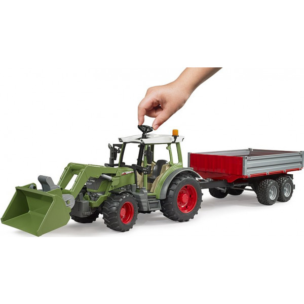 Фото - Наземная строительная техника BRUDER Трактор Fendt Vario 211 с передним погрузчиком и прицепом (02182)