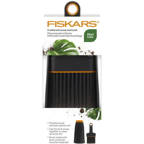 Фото - Набір садових інструментів Fiskars совок+щітка (1071302)