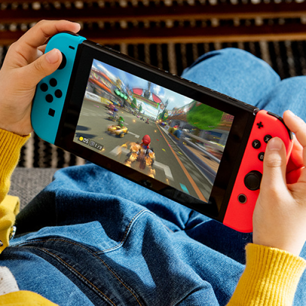 Фото - Ігрова приставка портативна Nintendo Switch (Neon Blue/Red)