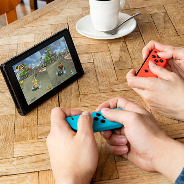 Фото - Ігрова приставка портативна Nintendo Switch (Neon Blue/Red)