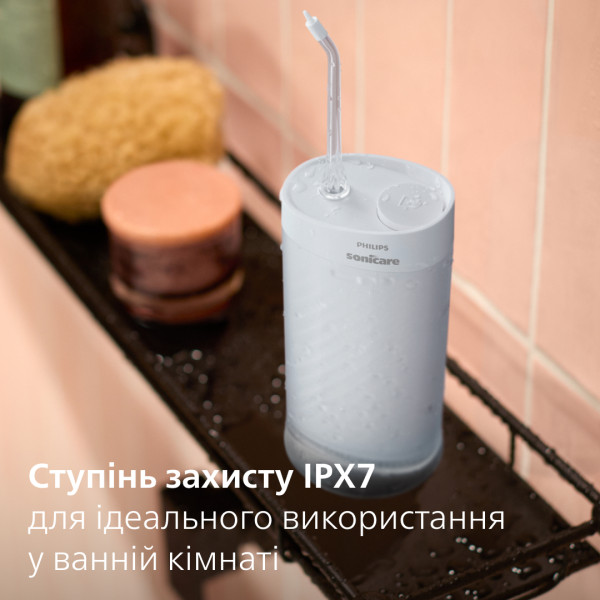 Фото - Іригатор Philips Sonicare HX3333/24 Compact Flosser 1000