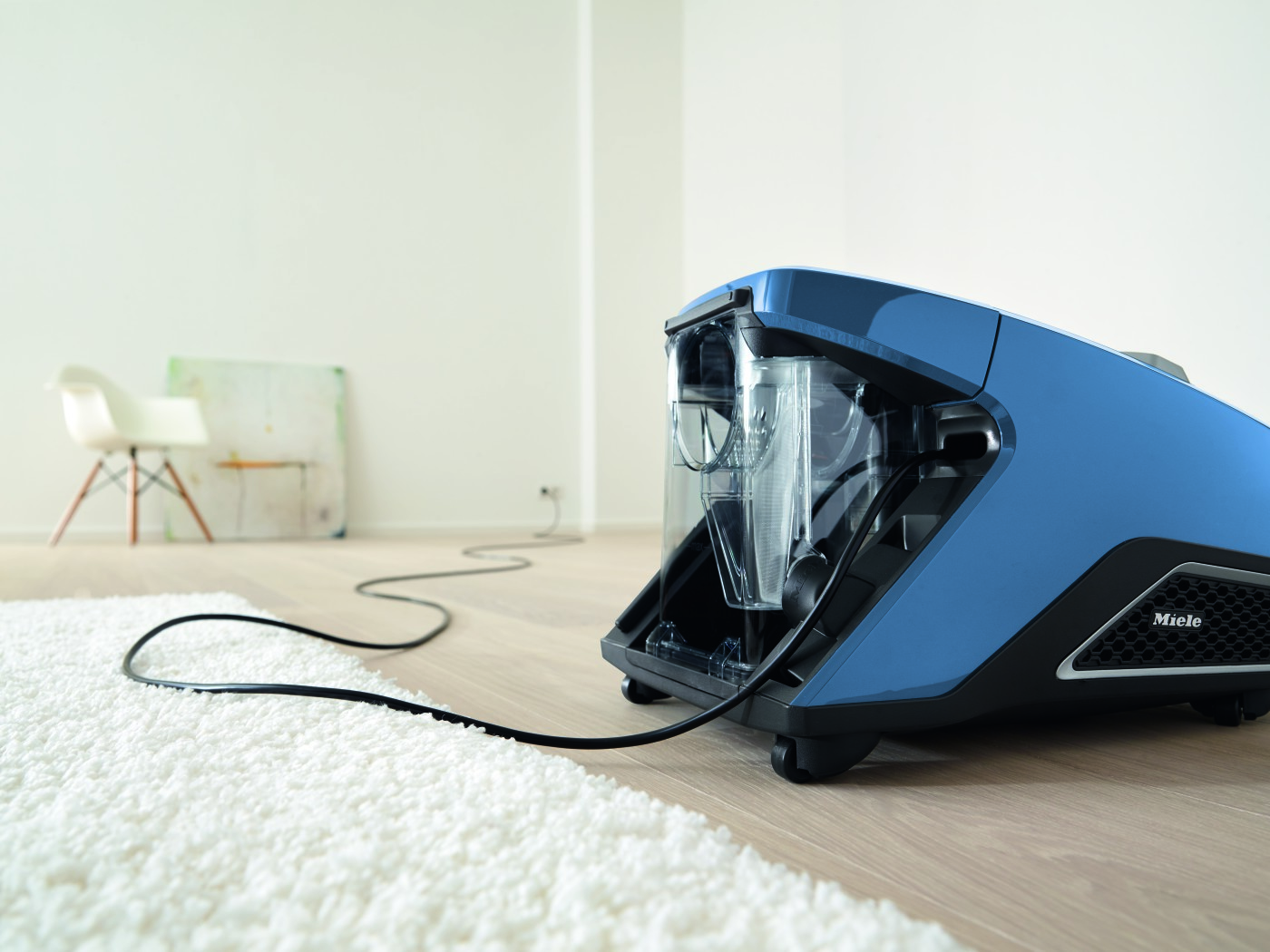 Пылесос для сухой уборки без мешка Miele SKCF3 Blizzard CX1 синий техно (parquet) - 9 Фото Пылесос для сухой уборки без мешка Miele SKCF3 Blizzard CX1 синий техно (parquet) - 9